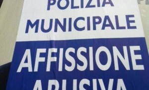 AFFISSIONE-ABUSIVA